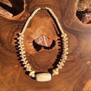 Vintage Ivory necklace with detailed beads, includes twist on clasp bracket.